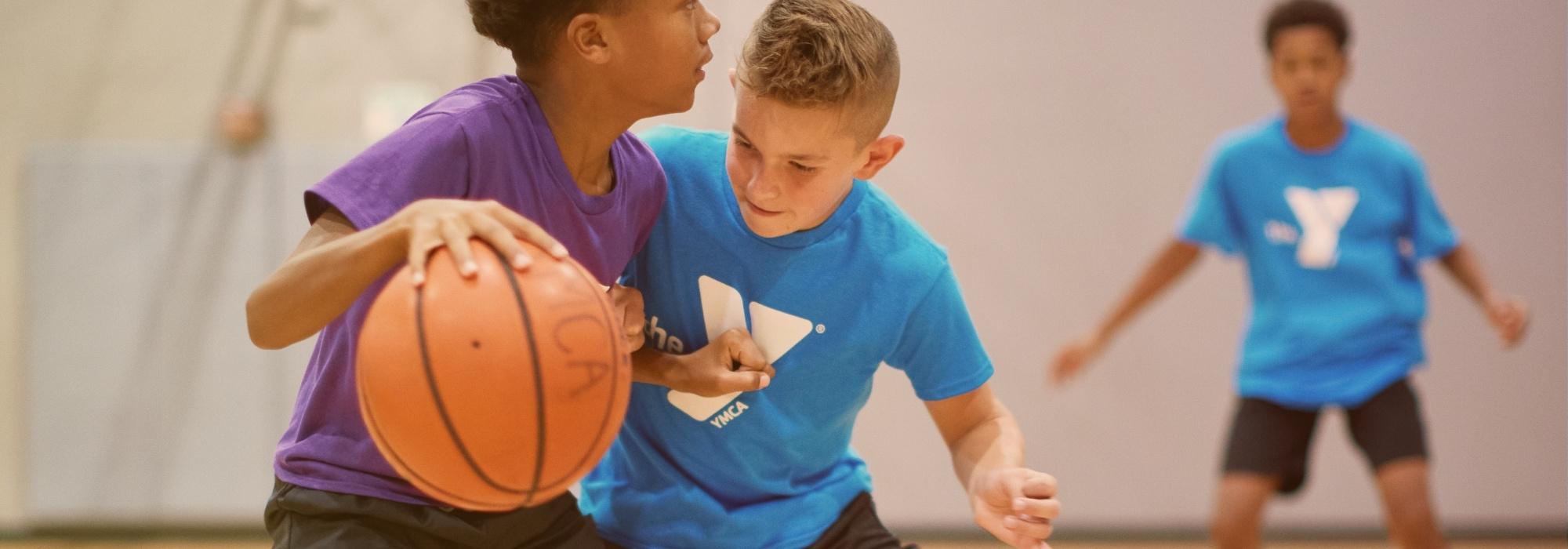 Boys playing Basketball