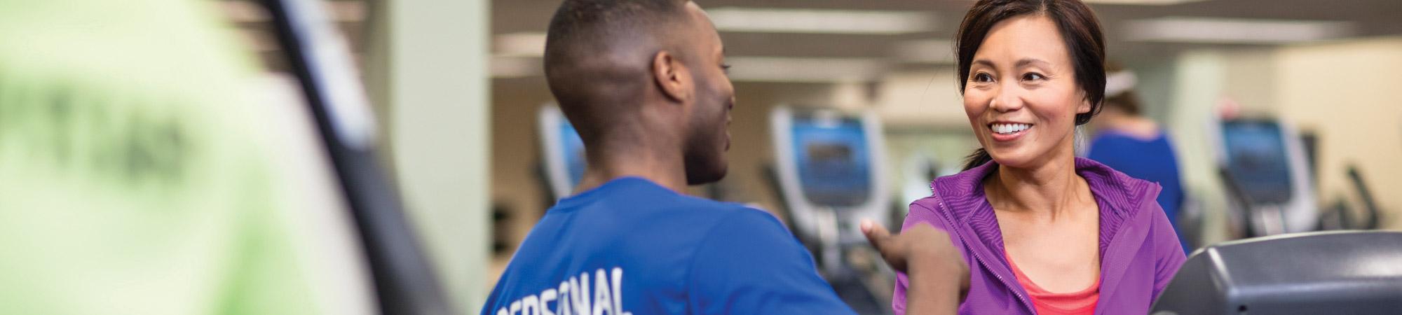 Personal Trainer with his client.